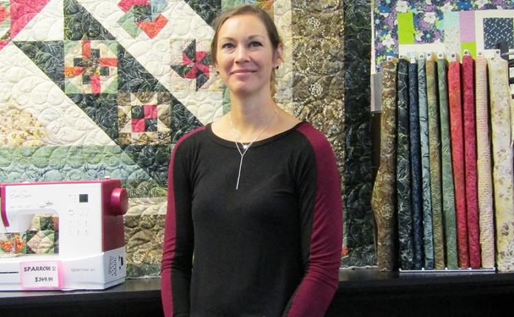 Tommie Berning recently purchased the Prairie Flower Quilt Co. She has been a quilter since childhood