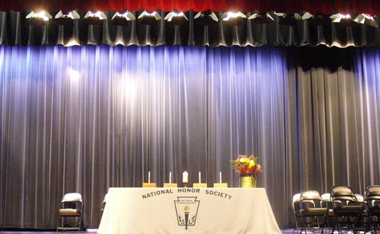 The stage is set to induct new members.