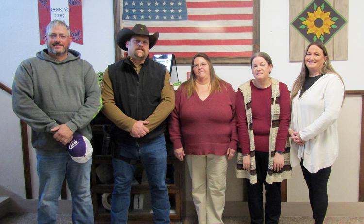 Above: Commissioner Carpenter, Sheriff Casper, County Clerk Kreutzer, Register of Deeds Leimkuhler, County Attorney Lewis. Not pictured: Magistrate Judge Korina Wedel. Left: Commissioner Jason Wells
