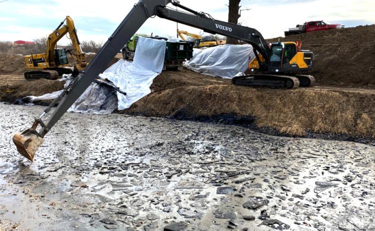 Crews work on oil recovery at Mill Creek on Dec. 28, 2022. Environmental Protection Agency