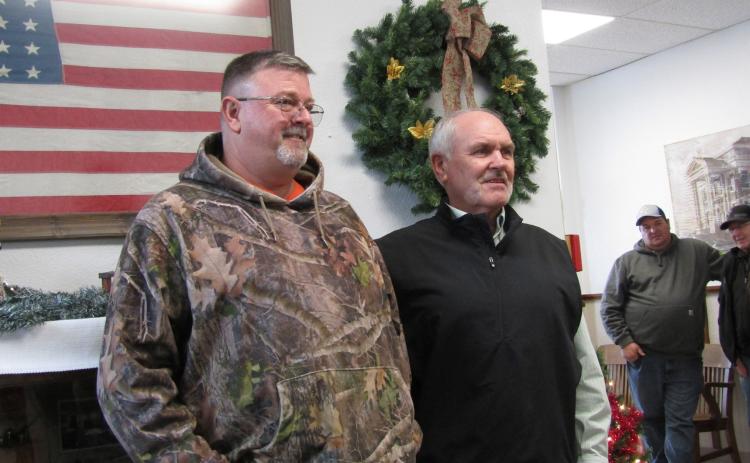 Above: County Commissioner Vic Case (right) congratulates incoming Commissioner John Gould after his swearing-in at their joint farewell/welcome party on Tuesday, January 3, 2023.
