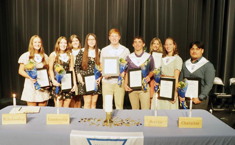 Above: Newly-inducted National Honor Society Members (L-R): Tessa Bauck, Jayah Case, Camryn Biermann, Nancy Ortiz-Chavez, Holden Whalen, Tyson Peters, Taylor Beedy, Joleigh Mazanec, Benedict Herbias Below: The WCHS National Honor Society Photos courtesy Sara Brown