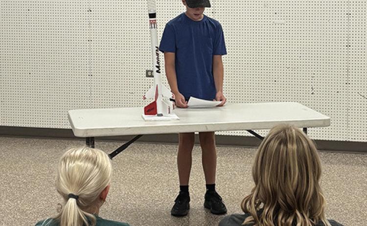 Forrest McKinney giving his rocketry project talk. Submitted