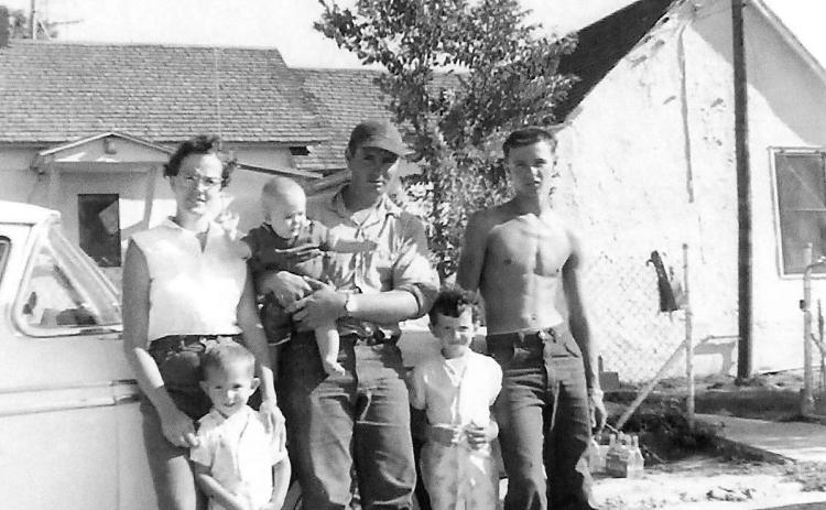 The Wiegers family in 1961. Lorna keeping Mike still, Dean holding Russ, Deana ready to get back to playing, and Dean’s brother Dave, cooling off. photo provided