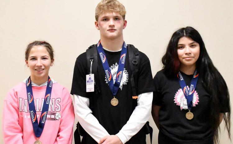 Above: WCHS State Wrestling Medalists: Jentri Porter (3rd-105), Beau Porter (6th-165), Angela Barreras (6th-135).